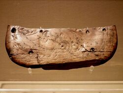 Butterfly-shaped ivory vessel with the pattern of two birds facing the sun(Neolithic) in Zhejiang Museum.JPG