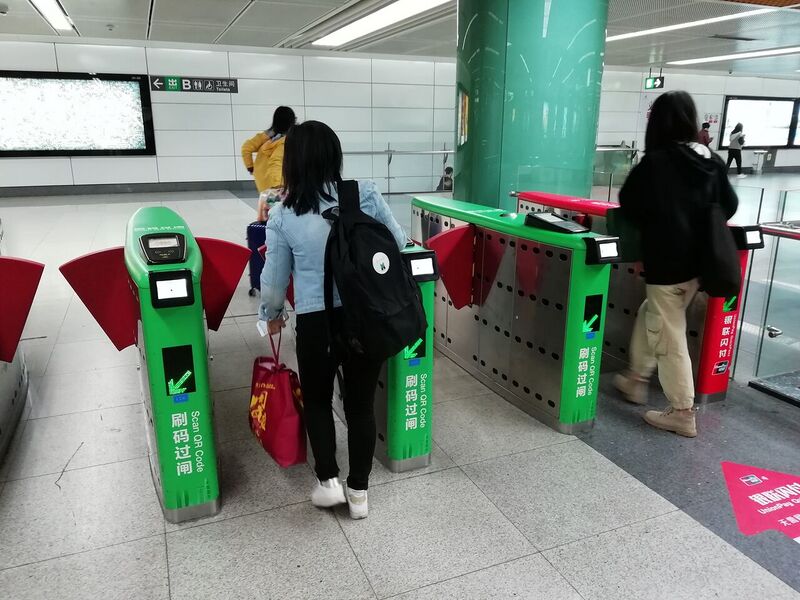File:Turnstiles in Luohu Station with QR Code Scanner.jpg