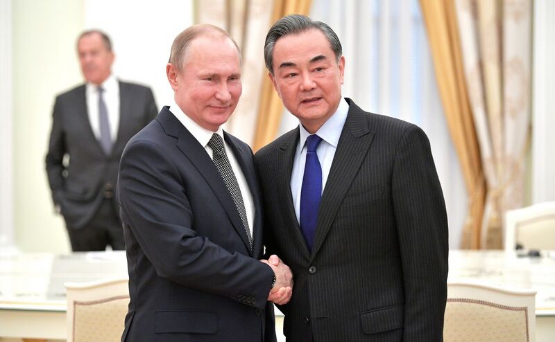 File:Vladimir Putin with Wang Yi (2018-04-05) 02.jpg