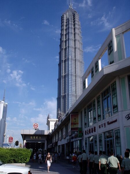 File:Jin Mao tower and metro station, with cadets in foreground, Shanghai.JPG